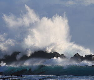 Huge wave crashes over coast at Handspike Point, Macquarie Island
