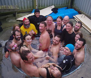 18 expeditioners cram into the Macca spa for a new record