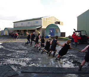 The Kiwi team in action during tug of war competitions outside at Macca