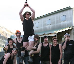 2012 Tug-a-war winners. The Kiwi team pose with trophy