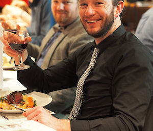 Richard and Matt at the dinner table during Midwinter celebrations