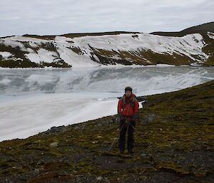 Cameron posing with ice in background