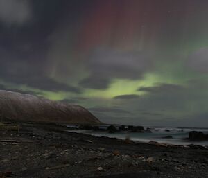 Green and red sheets of colour to the southwest of the island, 30 June 2012