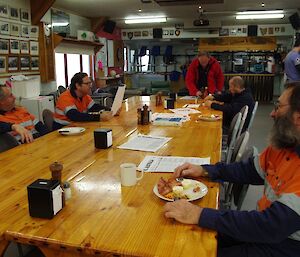 Station staff gather around the table for cooked morning tea, at which Tom reads out the trivia questions for the day.