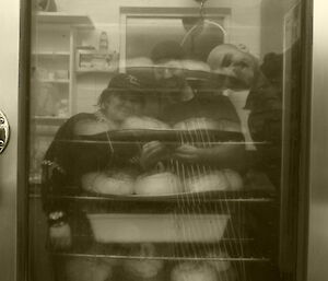 Maria, Steve and Stu reflection in the oven door