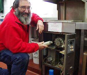 Ray repairing the kitchen steriliser