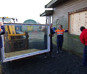 Matt, Dave, Jim and Ray installing the new window