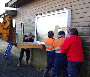 Window fitting into building wall