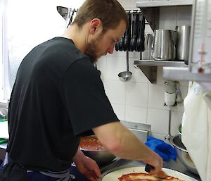 Cam in the kitchen making pizzas