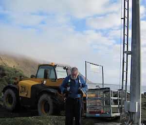 Gunny repairing the wind speed sensor