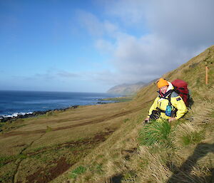 Narelle on the jump down at Waterfall Bay