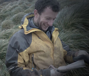 Richard looking over equipment during hunt