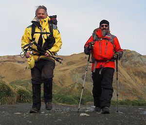 Two expeditioners pose in full gear before heading out on a walk or jolly