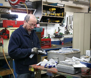Robby in the dieso’s workshop stocktaking items
