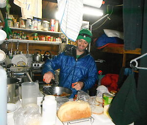 Steve preparing dinner at Green Gorge Hut