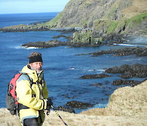 Garry posing by rocky shore