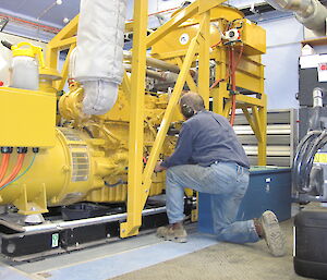 Robby in the main power house working on a machine
