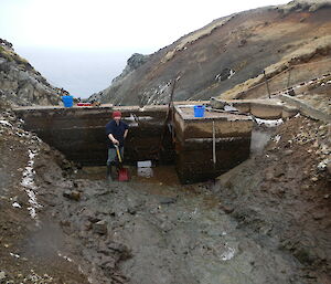 Robby (pictured) and Tom complete the work on the dam