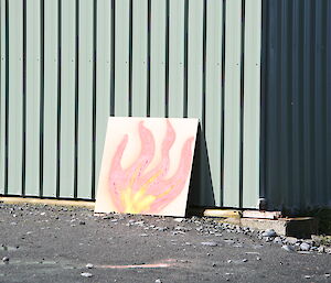 A medium sized painting of flames for use during a firefighting exercise