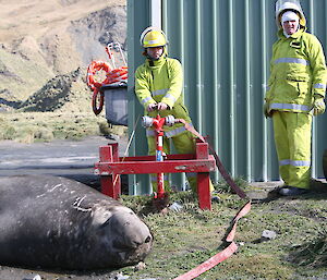 Andrew and Colin connecting the hose to the fire hydrant