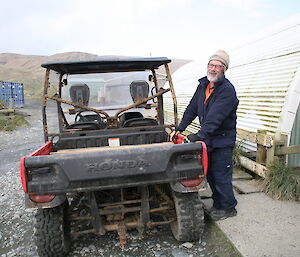 Gaz working on station, standing outside small vehicle