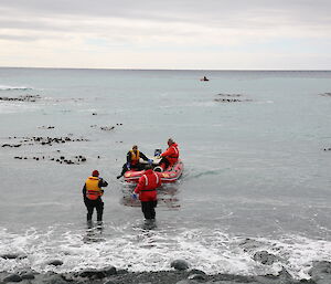 Boating team departing Landing Beach for Green Gorge