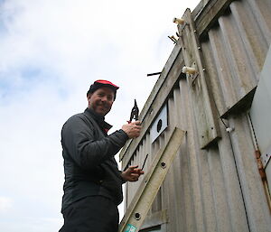 Tom adding a vent to Hurd Point hut