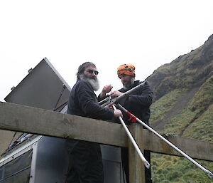 Ray and Pete repairing the wind turbine at Hurd Point