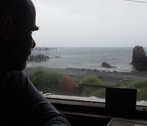 Stu seated at the very comfortable Green Gorge hut window