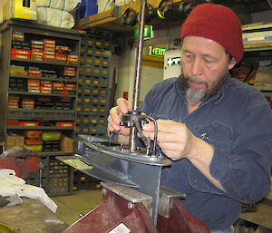 Robby checking the water pump in the workshop