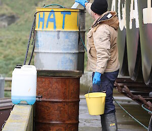 Charles adding liquid fertiliser ready for nutrient addition