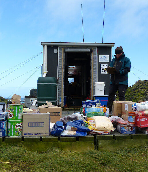 Kelly helping Steve with the food stocktake at Davis Point