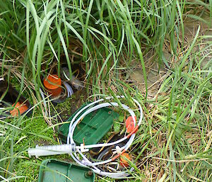 Water sampling instruments on the ground ready for use