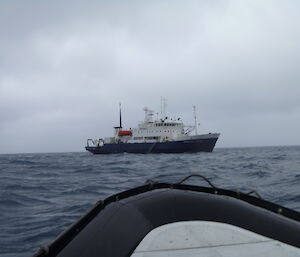 Cruise ship the Spirit of Enderby as seen by inflatable boat