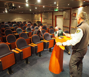 Ranger Paul in the Orion theatre waiting for an audience