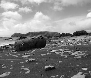 Macquarie Island heritage, west coast — black and white shot of beach and old metal drum