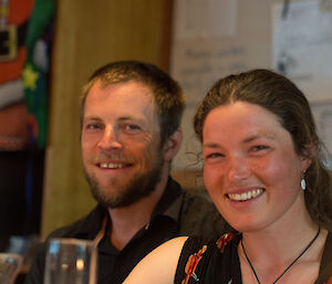Cam and Kelly smile for the camera at Christmas dinner