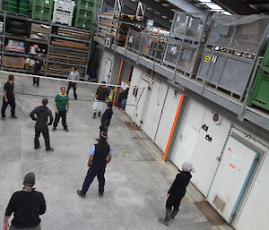 Boxing Day volleyball — expeditioners waiting for game to start, in position