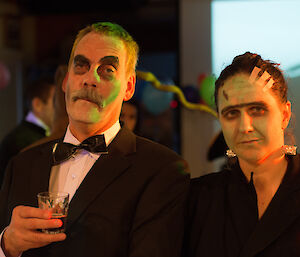 Two expeditioners, Greg and Lauren, dressed as The Munsters with makeup to make them look ghoulish