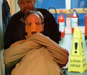 Robby wheels in Hannibal Lecter (Chris in costume)