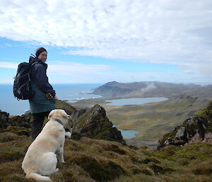 Female expeditioner enjoying the views over the coast