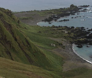 Looking down the steep gully to the hut on the coast