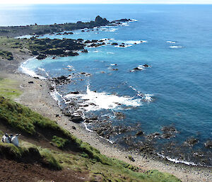 Small cove, rocky beach, blue ocean