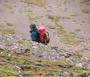 Expeditioner hunting along a slope