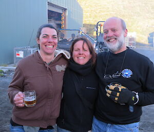 Close up of three expeditioners posing for the camera