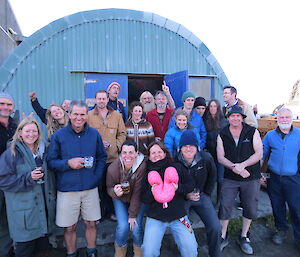 Team photo of 20 expeditioners looking towards the camera