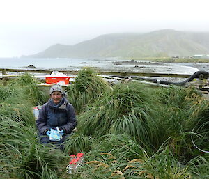 Female expeditioner working outside in the open, her office being the outdoors