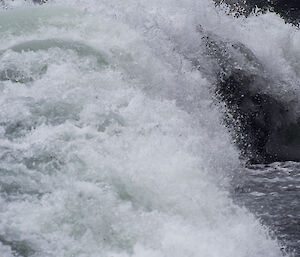 Close up of a wave crashing lots of white water