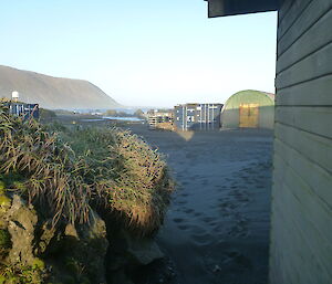 photo of station buildings and the ocean in the background