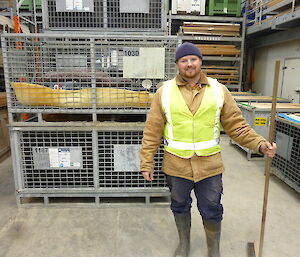 Male expeditioner standing in a warehouse